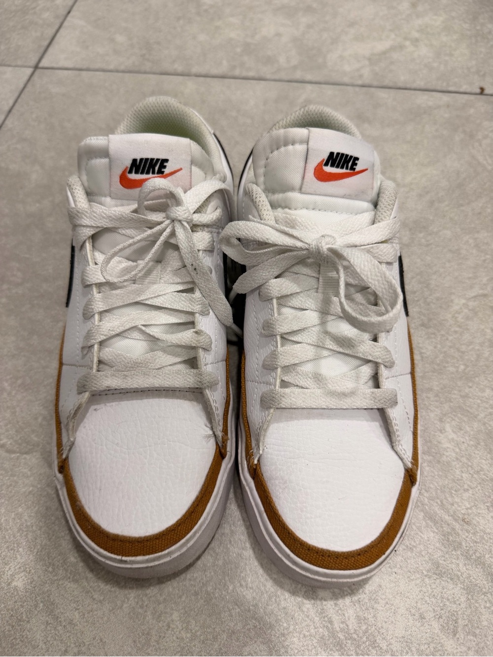 Nike White Sneakers with Brown and Orange Accents